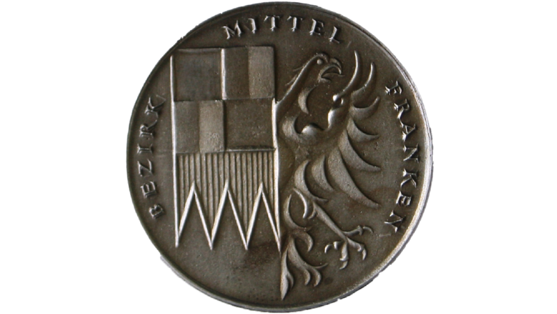 Die Vorderseite der Bezirksmedaille.